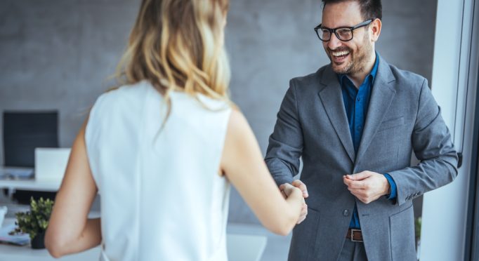 Portrait,Of,Cheerful,Young,Manager,Handshake,With,New,Employee.,Close